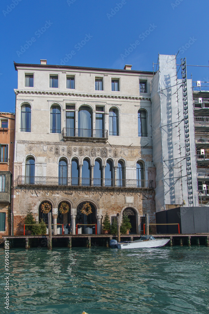 View from a boat at the Canal Grande with typical facades, Venice, Veneto, Italy