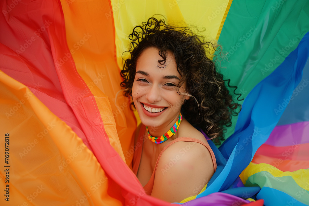 Φωτογραφία Queer woman, beautiful woman with the lgbt flag around her in a copy space for g