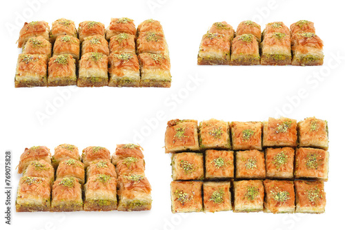 Eastern sweets. Pieces of delicious fresh baklava with chopped nuts isolated on white, set