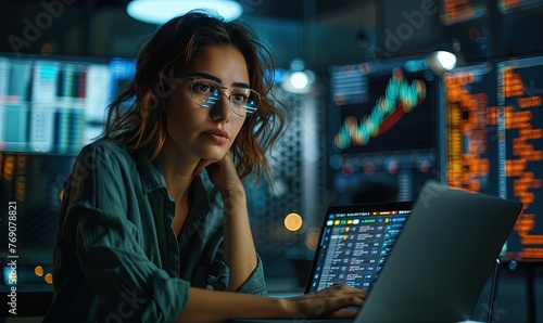 A businesswoman working on a laptop, a bank consultant or working on a research report, project or solution.