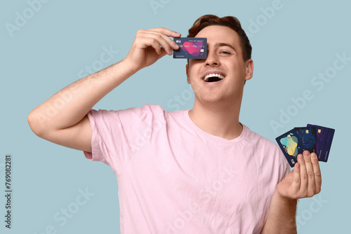 Young man with credit cards...