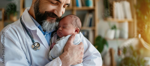 Pediatrician doctor holding a newborn baby in hospital, concept of childbirth and healthcare professionals photo