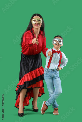 Mother and son in costumes ...