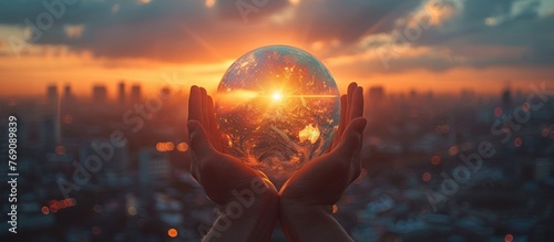 Hands touching earth and circle global network connection, data exchanges worldwide on city sunset background. photo