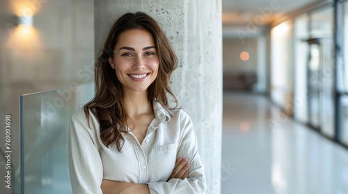 Confident businesswoman in a bright modern office. Free Download Confident businesswoman in a bright modern office. - GFXLoad
