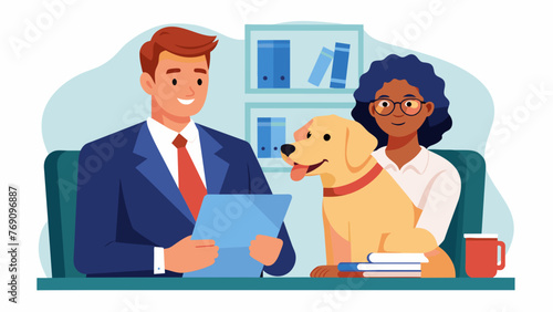 An attorney and their client who uses a service dog for assistance sit together in a comfortable office as they review important documents.