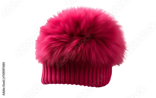 A vibrant pink hat adorned with a cute fur ball on top, adding a touch of whimsy to any outfit