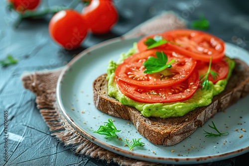 Toast bread with avocado puree and tomatoes on wooden table. Vegetarian food.