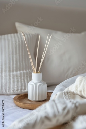 Serene Bedroom Ambiance With Scented Diffuser on Wooden Tray at Daytime
