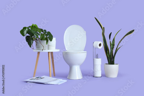 Toilet bowl with paper roll...