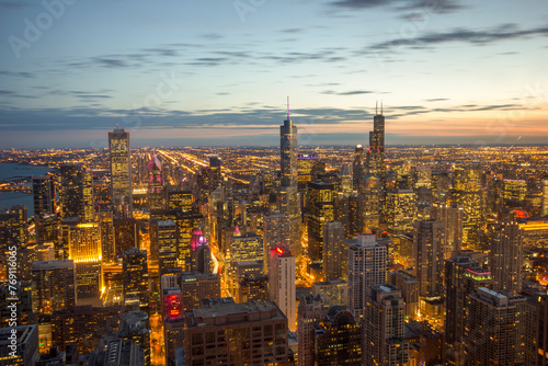 Beautiful scenic view of business district of Chicago loop with skyline in evening sunlight. Panoramic view aerial top view or drone architecture view of city. Chicago, USA.