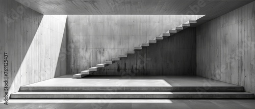   A monochrome image depicts a set of stairs ascending from a ground-floor room with concrete walls, leading to the second level