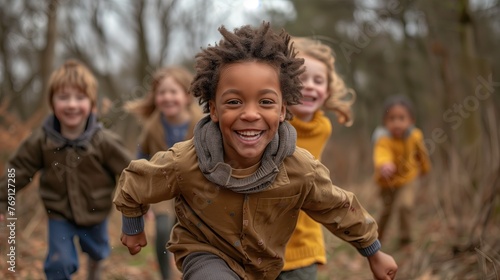 Photography of multi-racial group of children having fun in the forest.