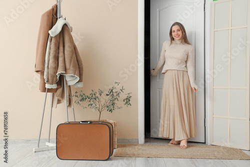 Young woman walking through...