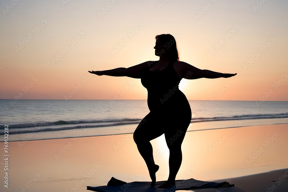 Silhouette of a overweight woman practicing yoga on the beach at sunset. Healthy lifestyle concept, poster, banner, copy space.
