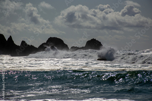  Crashing Waves and Jagged Rocks