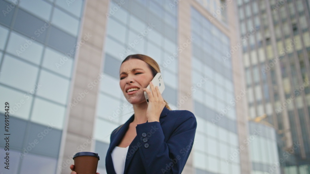 Woman enjoy cellphone call walking modern street with coffee takeaway close up. Woman enjoy cellphone call walking modern street with coffee takeaway close up.