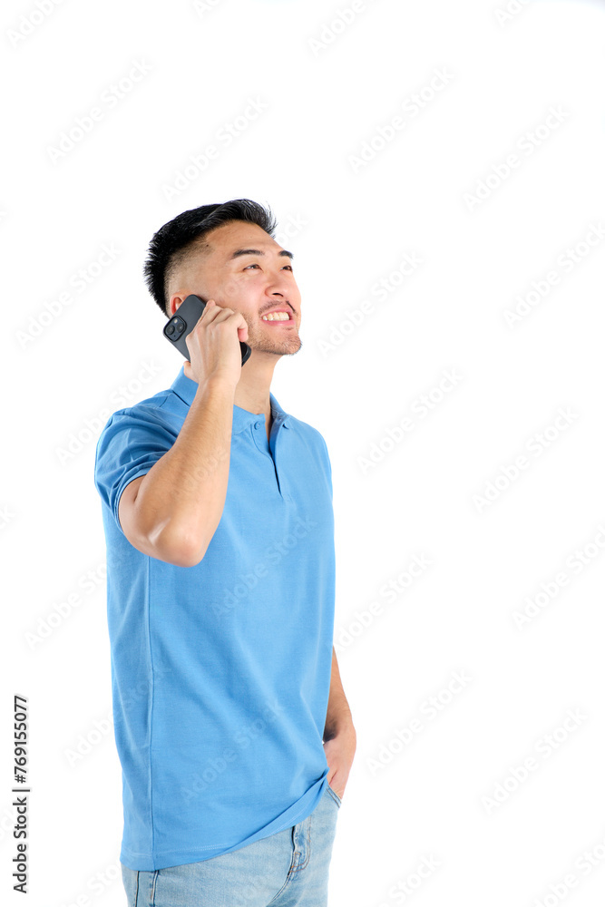 young oriental man smiling talking on his smart phone on white background young oriental man smiling talking on his smart phone on white background