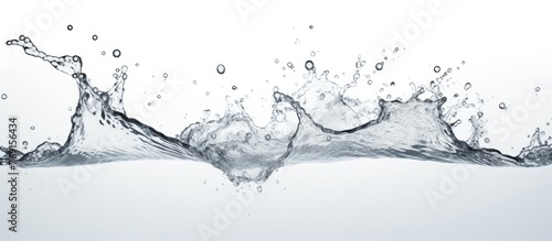 Water is splashing intensely on a clean, white surface, creating a dynamic and refreshing image
