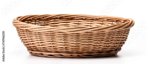 Detailed view of a basket against a plain white background, focusing on its pattern and texture