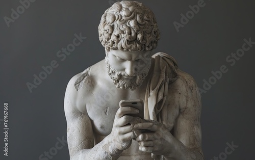 A classic Ancient Greek marble sculpture of a man holding a phone in his hands and looking at the screen. The statue of a man communicates on a social network using a mobile phone 1