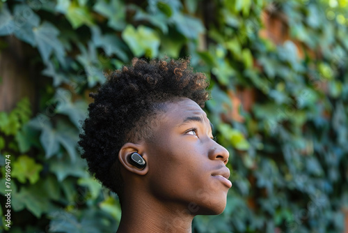 Portrait of a afro amercian student with wireless headphones photo