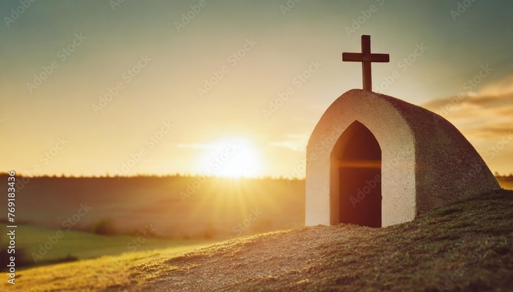 easter sunday concept tomb empty with cross on sunset background copy space