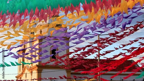 igreja de são joão com bandeiras coloridas de festa junina no brasil photo