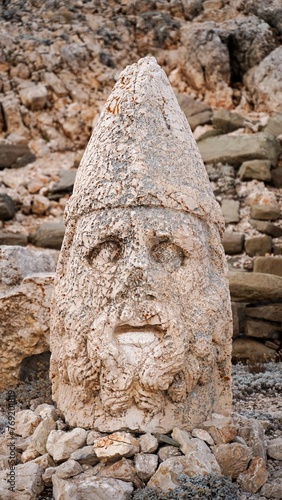 Antique ruined statues on Nemrut mountain in Turkey. ancient Kingdom of Commagene in south east Turkey. photo