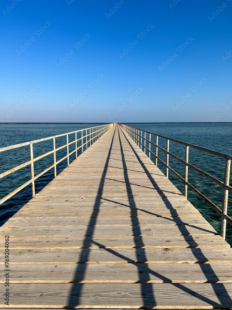 Wooden Bridge Over The Sea