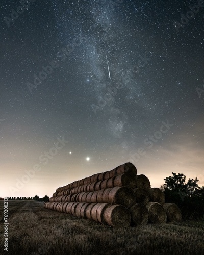 Perseids shooting star over field after harvest, Brandenburg, Germany, Europe photo