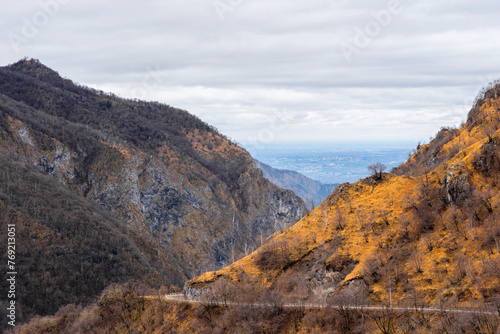 Beautiful panoramic view above the Alps mountain chain at daytime during autumn season, Italy