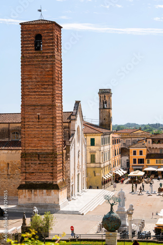 Cityscape of medieval Italian town Pietrasanta, main square, roofs of small houses, aerial view, Italy