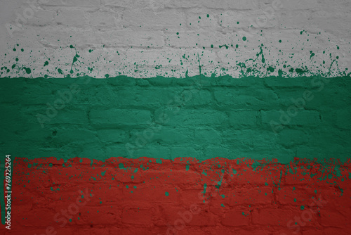 colorful painted big national flag of bulgaria on a massive brick wall