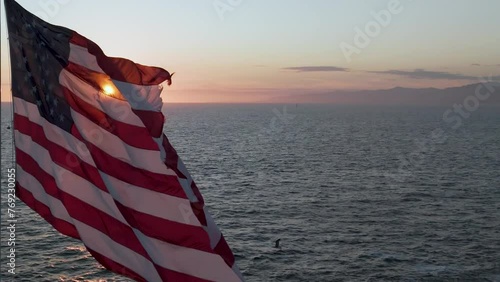 The American flag is waving in the wind. photo