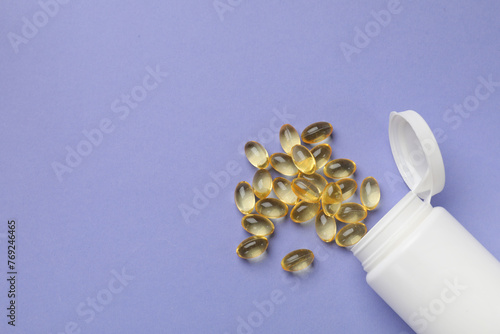Wallpaper Mural White bottle and vitamin capsules on violet background, top view. Space for text Torontodigital.ca