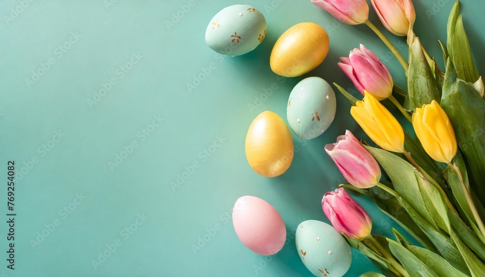 easter celebration concept top view photo of colorful easter eggs and bunches of yellow and pink tulips on isolated teal background with copyspace - obrazy, fototapety, plakaty 