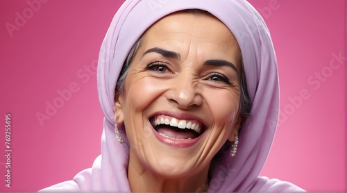 young middle eastern elderly woman on plain bright pink background laughing hysterically looking at camera background banner template ad marketing concept from Generative AI