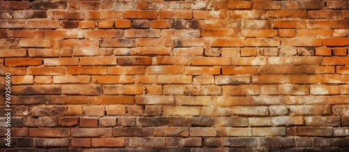 A closeup image of a brown brick wall showcasing the intricate patterns of the brickwork. The blurred background creates a peaceful setting with hints of peach tones
