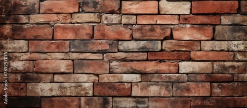 A detailed closeup of a brown brick wall, showcasing the rectangular shape and composite material of the building material. The font of the brickwork resembles a sturdy stone wall