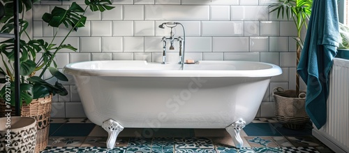 Stylish bathroom renovation with white bathtub  retro faucet  and modern ceramic tiles on wall