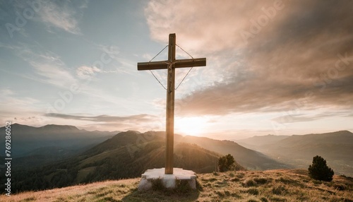 holy week cross in the mountains at sunset
