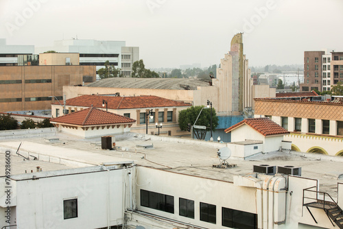 Inglewood, California, USA - October 7, 2022: Afternoon foggy sunlight shines on historic downtown Inglewood.