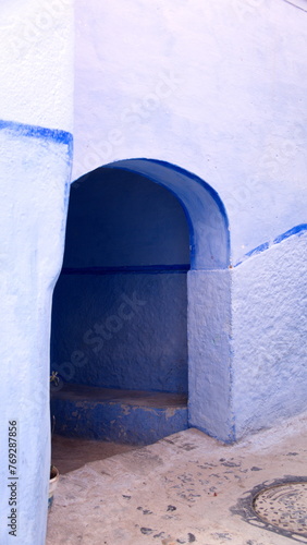 Arched entrance in an alley in the medina in Chefchaouen, Morocco © Angela