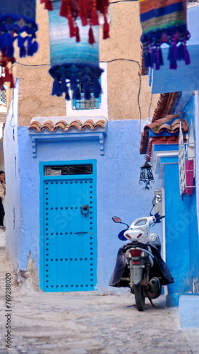 Motorcycle parked in the medina in Chefchaouen, Morocco © Angela