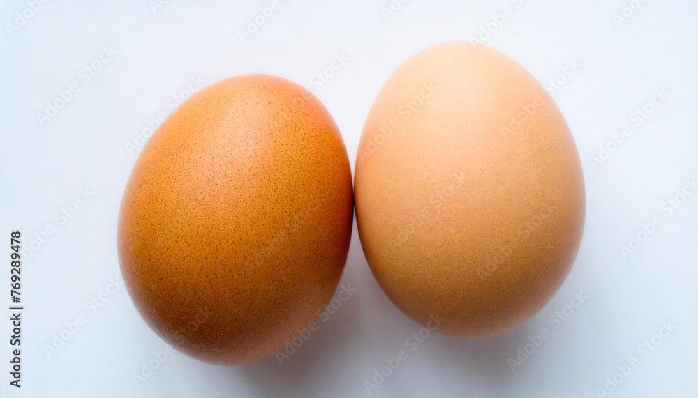 Couple brown chicken egg on white background, top view Couple brown chicken egg on white background, top view