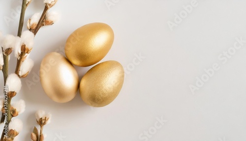 three easter golden decorated eggs isolated on white background minimal easter concept happy easter card with copy space for text top view flatlay