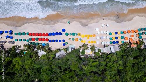 Aerial view of Madeiro beach, Tibau do Sul, Natal, Rio Grande do Norte, Brazil. Sunshade top view photo