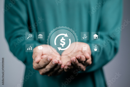 Businessman holding investment icon on virtual screen for fund financial investment management portfolio diversification photo