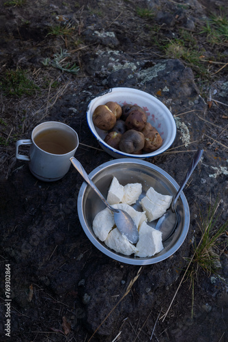 Boiled potatoes and cheese with boiled water are a natural and humble nutritious breakfast in the mountains of Peru © ELVIZZ